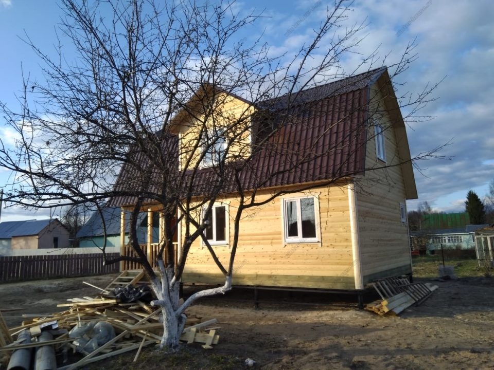 Фото строительства дома из бруса 6х9 с мансардой и террасой