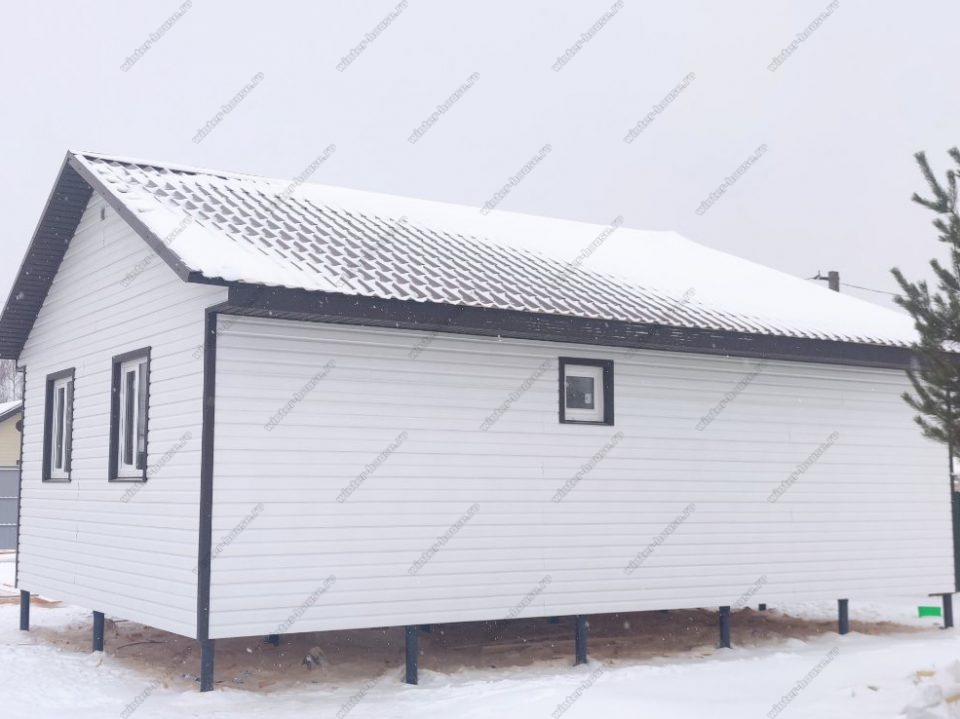 Одноэтажный дом с виниловым сайдингом белая кость